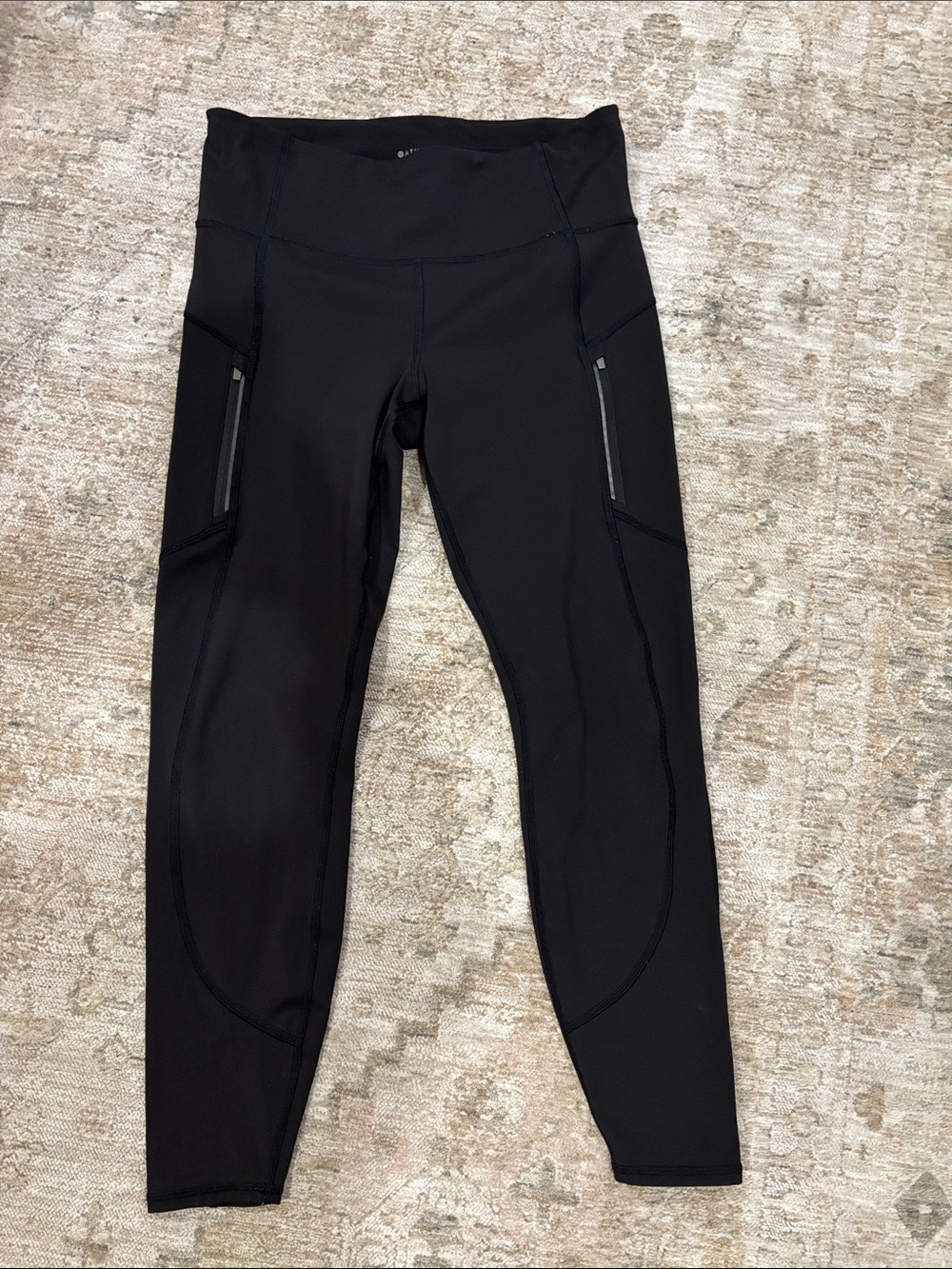 Athleta Black High-Rise Performance Leggings with Zip Pockets